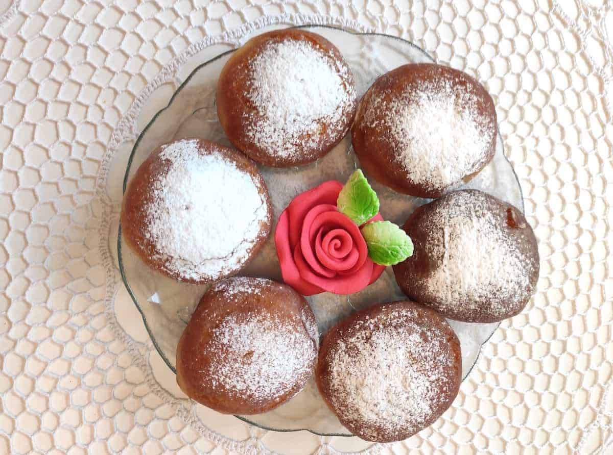 Paczki donuts dusted with powdered sugar