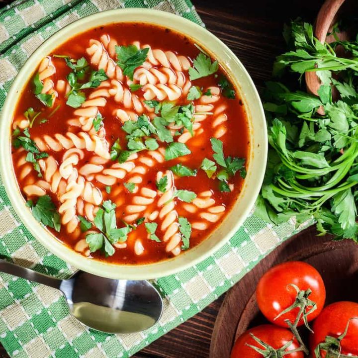 An authentic Polish tomato soup with tomatoes and parsley.