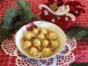 Ryba w galarecie in a white bowl.