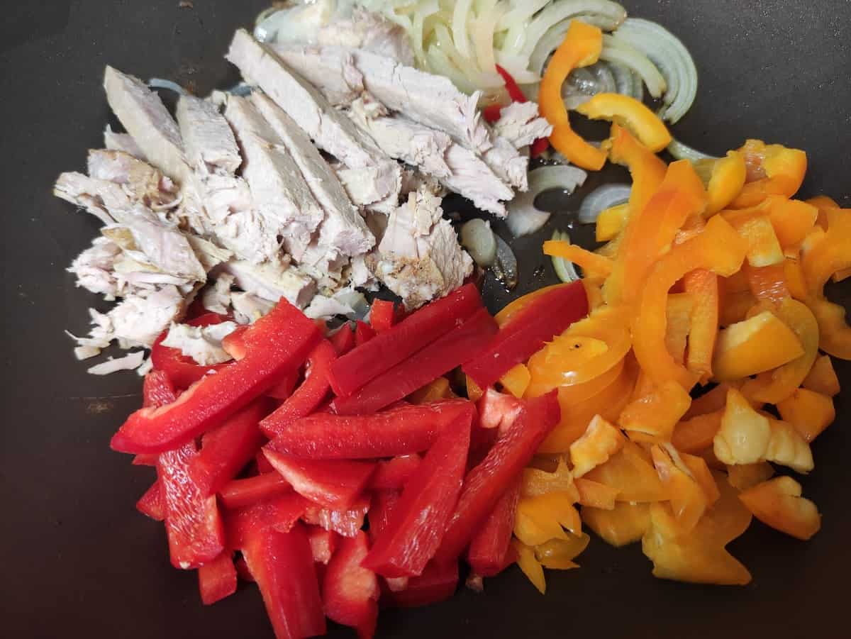 Chicken strips and bell peppers.