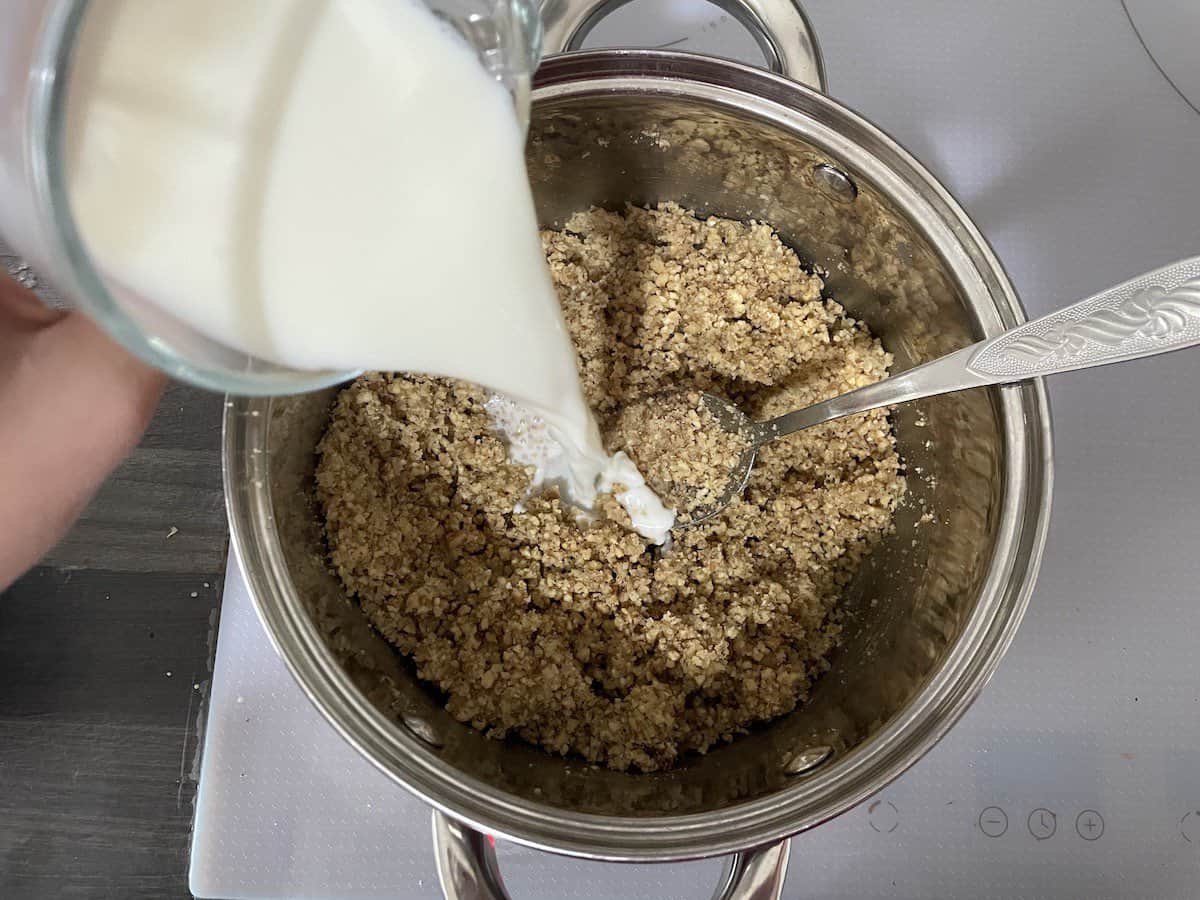 Add in the walnuts and the milk.