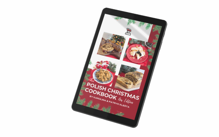 A tablet displaying the cover of a digital cookbook titled "Polish Christmas Cookbook." The festive cover, part of a Christmas Kit, features food photos, decorations, and text by Karolina & Patryk Klesta.